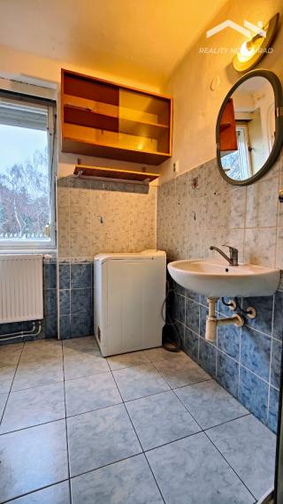 Komorné bývanie v tehlovom dome: 2-izbový byt so záhradkou – Halič