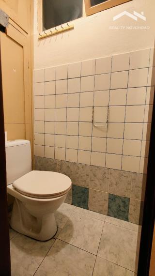 Komorné bývanie v tehlovom dome: 2-izbový byt so záhradkou – Halič